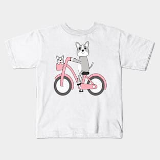 Kawaii corgi dogs riding a pink bike Kids T-Shirt